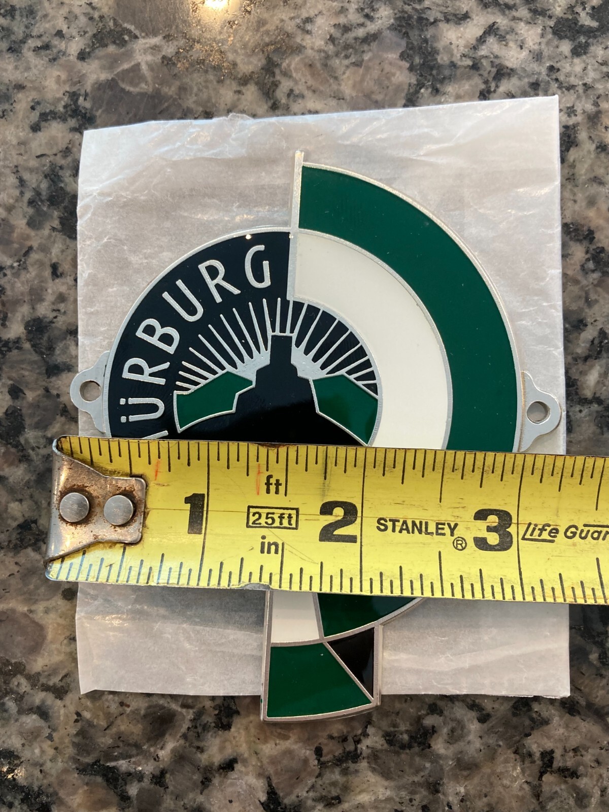 REPRODUCTION GERMAN NURBURG-RING (NURBURGRING) ENAMEL GRILL BADGE W/HARDWARE.
