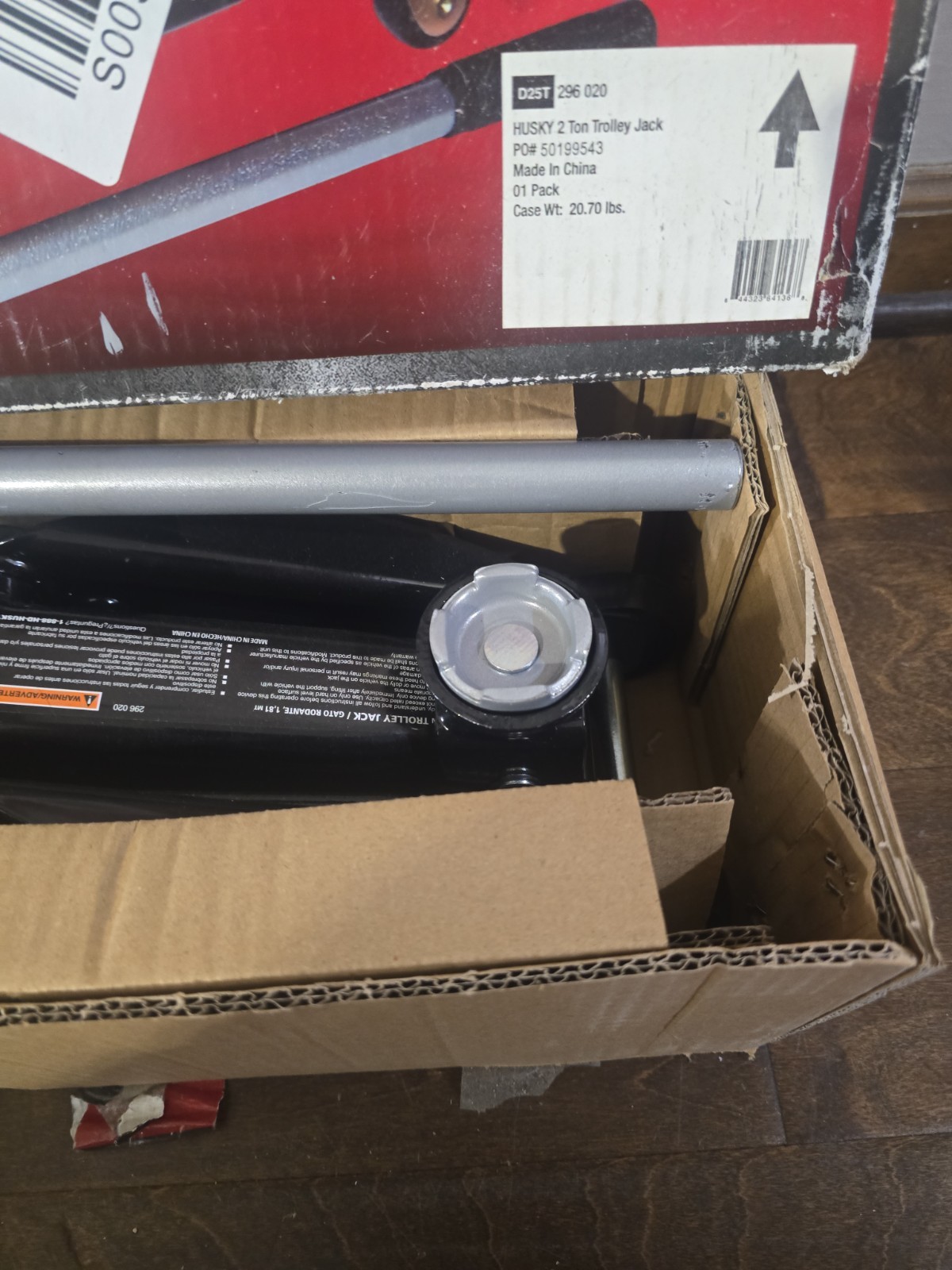 Husky 2-Ton Hydraulic Trolley Floor Jack, lifting range of 5 in. to 13 in.