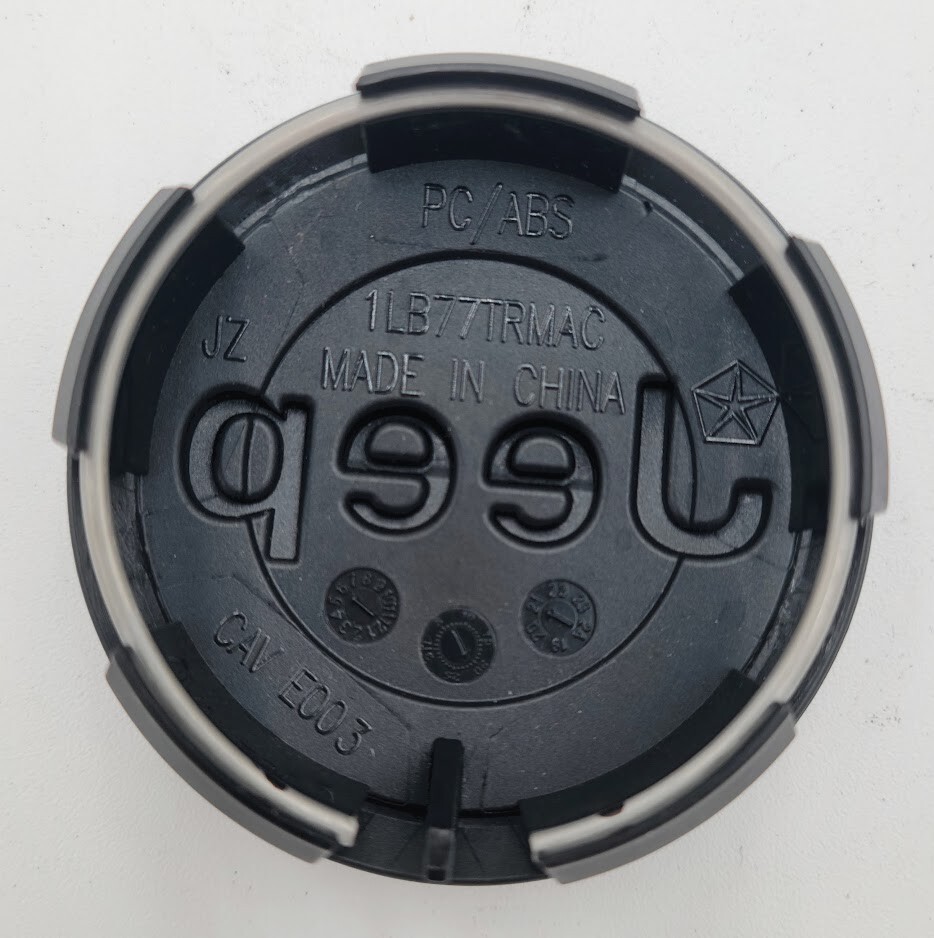 OEM Jeep 2.5″ Matte Black Center Cap – Minor Mark- 1LB77TRMAC/1LB77RXFAC